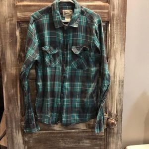A blue flannel button up